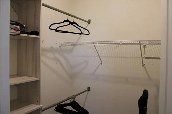 a view of a room with rack on the wall