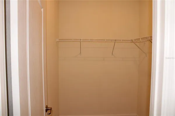 a view of a room with racks on the wall