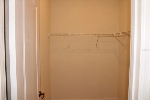 a view of a room with racks on the wall