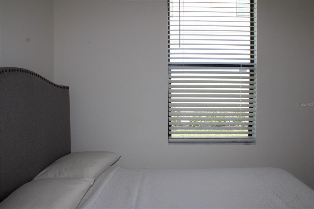 6647 Clairborne Lane Bradenton, FL 34211 - Photo 20 of 39 a view of an empty room with a window