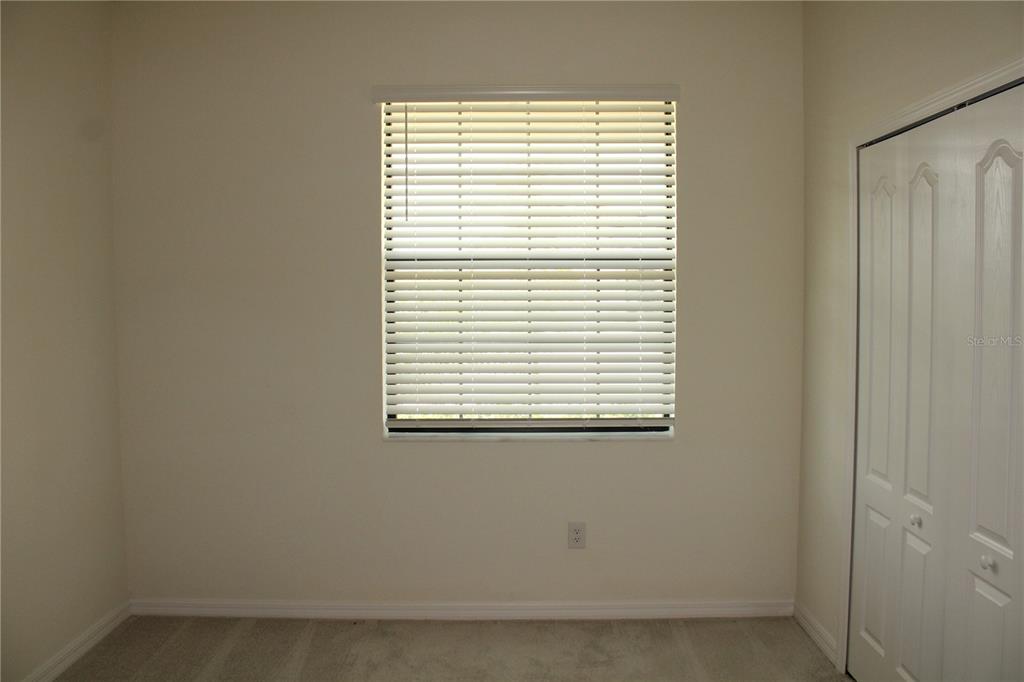 6647 Clairborne Lane Bradenton, FL 34211 - Photo 22 of 39 a view of a room that has a window in it