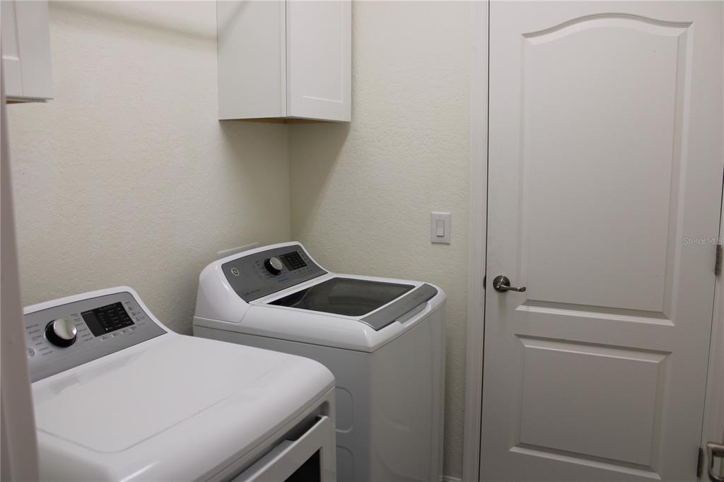 6647 Clairborne Lane Bradenton, FL 34211 - Photo 25 of 39 a utility room with dryer and washer