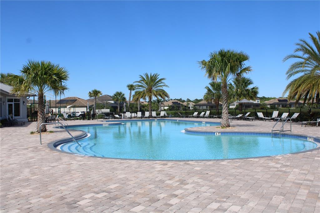 6647 Clairborne Lane Bradenton, FL 34211 - Photo 36 of 39 a view of a swimming pool with outdoor seating