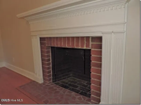 a living room with a fireplace