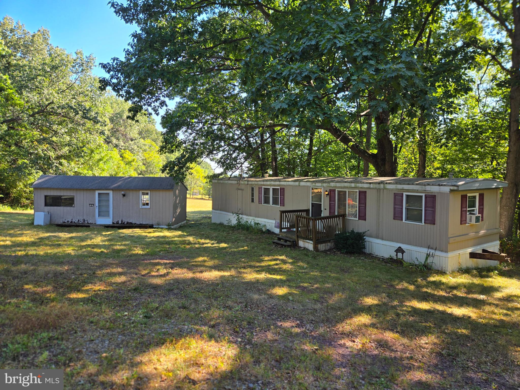 6721 Old Plank Road Broad Top, PA 16621 - Photo 18 of 18 a view of a house with a yard