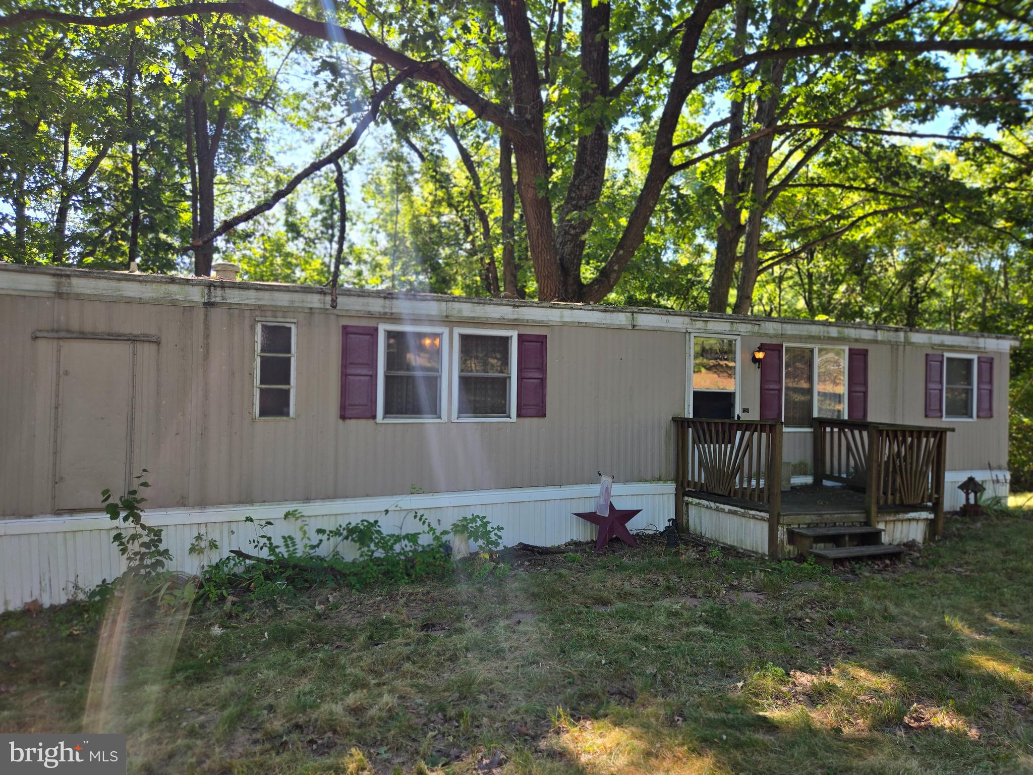 6721 Old Plank Road Broad Top, PA 16621 - Photo 2 of 18 front view of a house with a yard