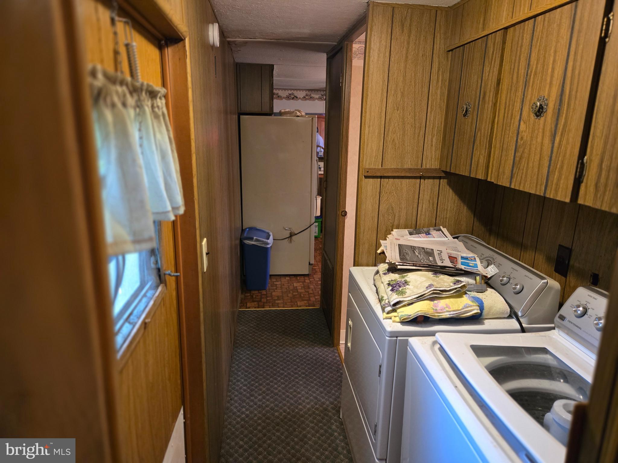 6721 Old Plank Road Broad Top, PA 16621 - Photo 7 of 18 a kitchen that has a sink stove and refrigerator