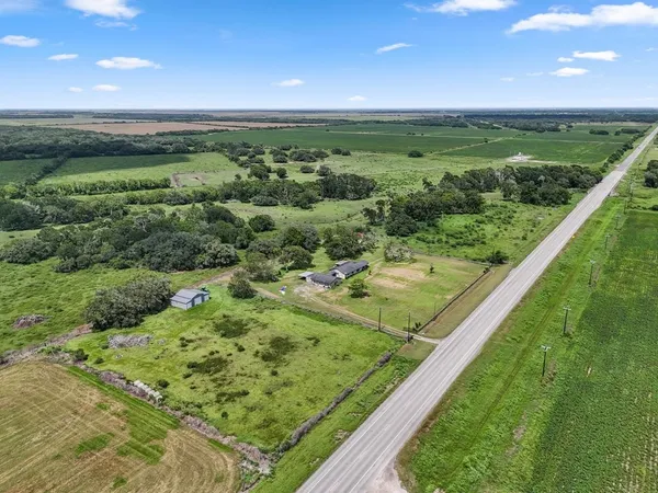 a view of a lush green field
