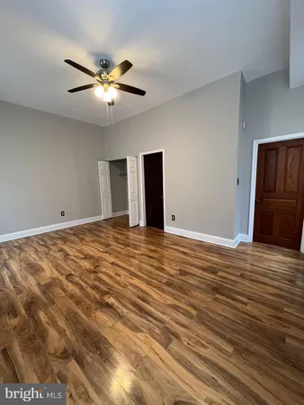 a view of a livingroom with a ceiling fan
