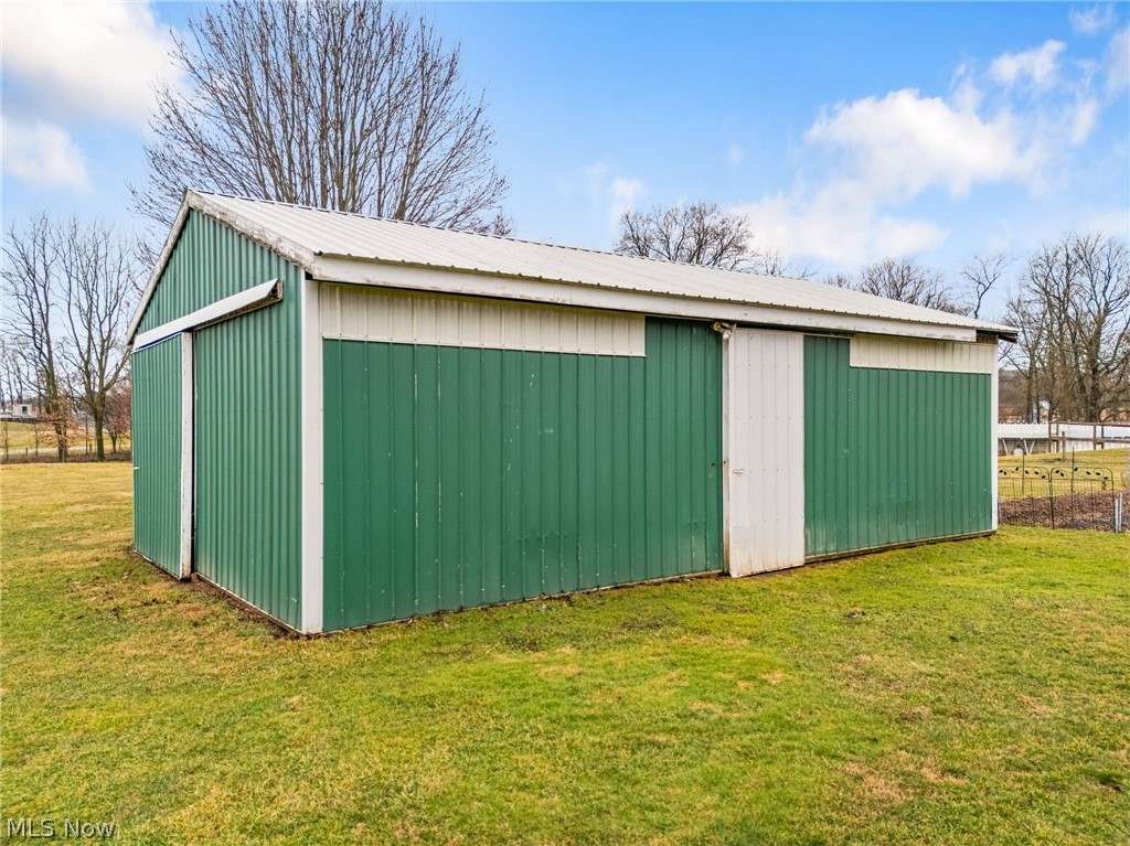 1640 Old Delaware Road Mount Vernon, OH 43050 - Photo 38 of 49 View of pole building featuring a yard