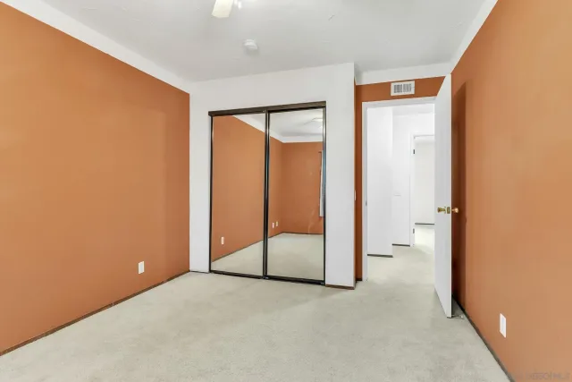 an empty room with a bathroom