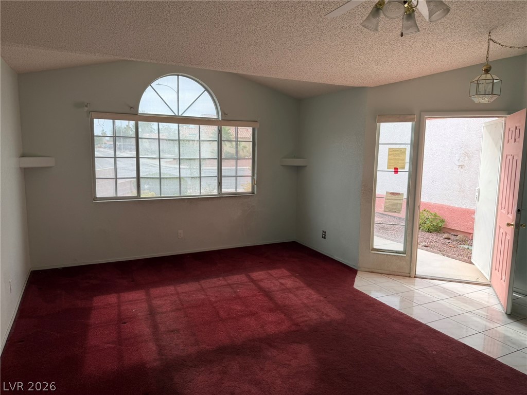 277 Gentle Bay Avenue Henderson, NV 89074 - Photo 43 of 43 This airy living space features abundant natural light and versatile flooring options.