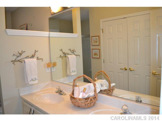 704 West Cheval Drive Fort Mill, SC 29708 - Photo 8 of 16 a bathroom with a sink and a mirror