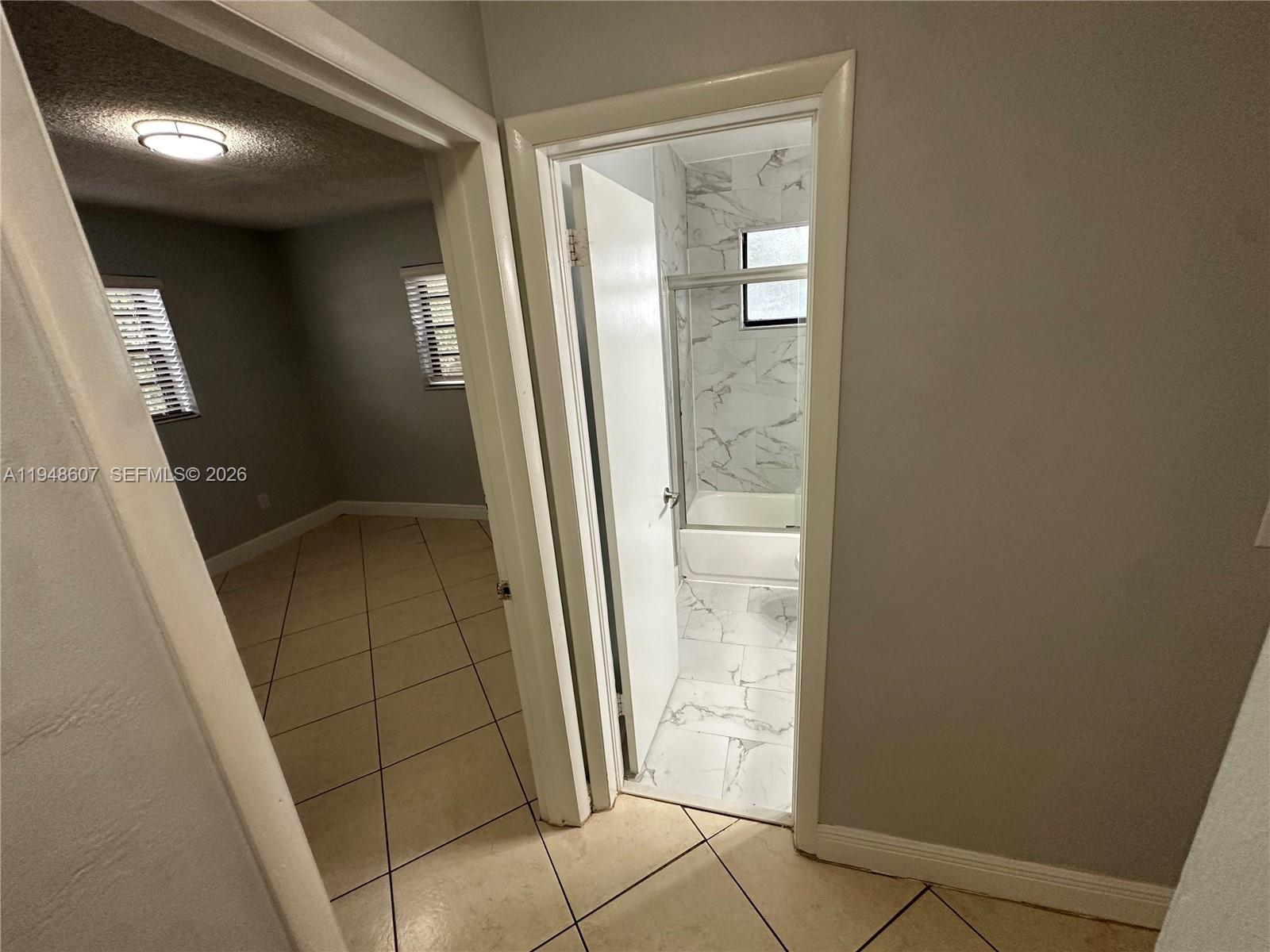 7860 Southwest 16th Street Miami, FL 33155 - Photo 17 of 32 wooden floor in an empty room
