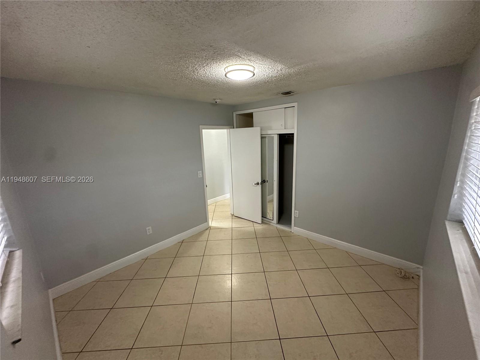 7860 Southwest 16th Street Miami, FL 33155 - Photo 19 of 32 a view of an empty room