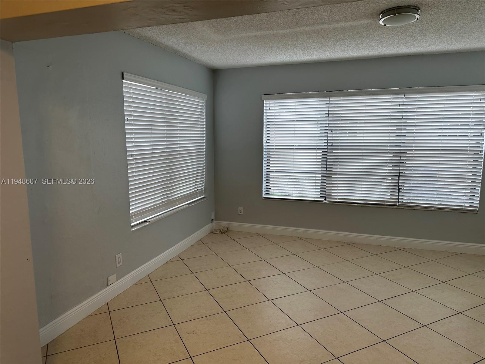 7860 Southwest 16th Street Miami, FL 33155 - Photo 26 of 32 a view of an empty room with a window