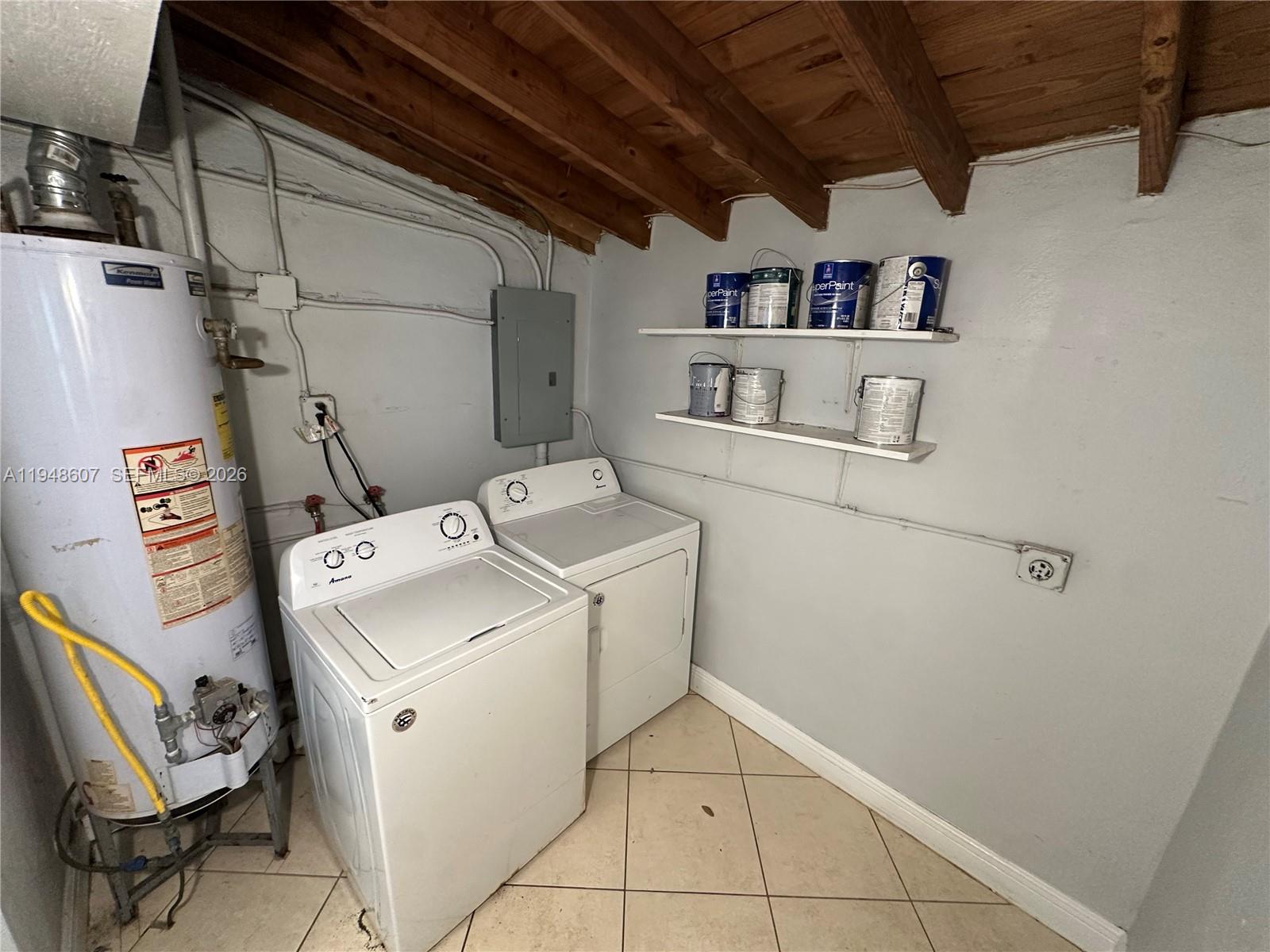 7860 Southwest 16th Street Miami, FL 33155 - Photo 30 of 32 a utility room with dryer and washer