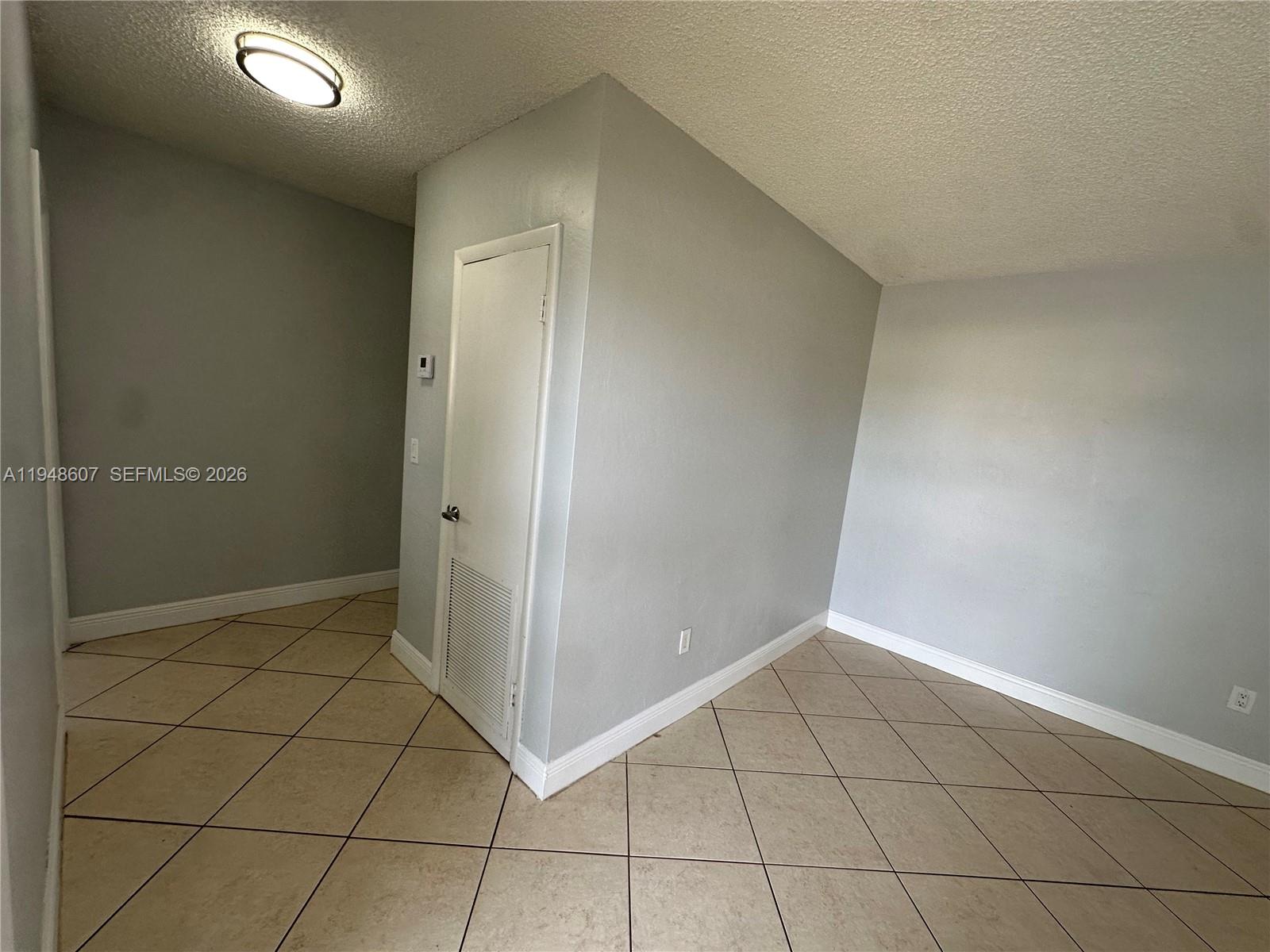 7860 Southwest 16th Street Miami, FL 33155 - Photo 6 of 32 a view of an empty room