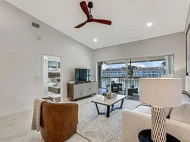 a view of a livingroom with furniture and window