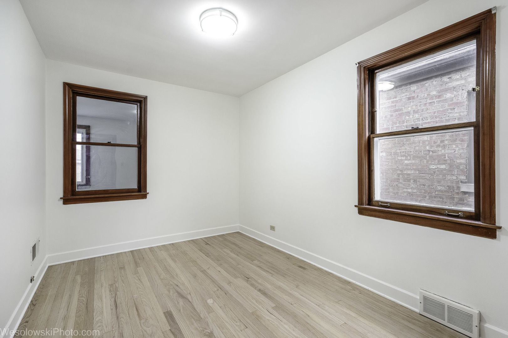 5944 West Foster Avenue Chicago, IL 60630 - Photo 7 of 21 an empty room with a window