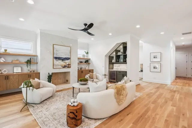 a table with a vase and flowers on it