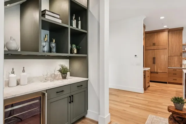 a bathroom with a sink vanity mirror and toilet