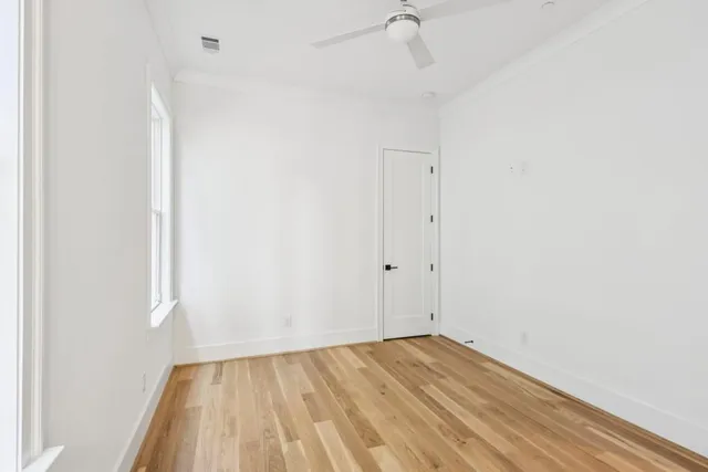 a bathroom with a toilet and a vanity
