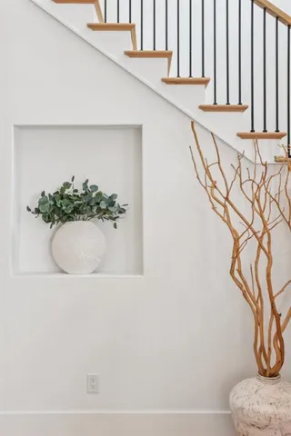 a kitchen with stainless steel appliances kitchen island granite countertop a sink a counter space and cabinets