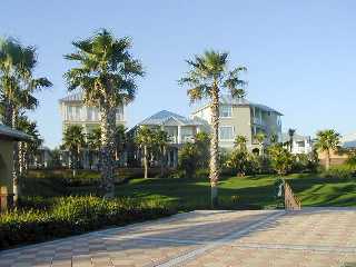 D-5 D-5 Beach Inlet Beach, FL 32461 - Photo 1 of 1 a view of a white house with a yard and potted plants