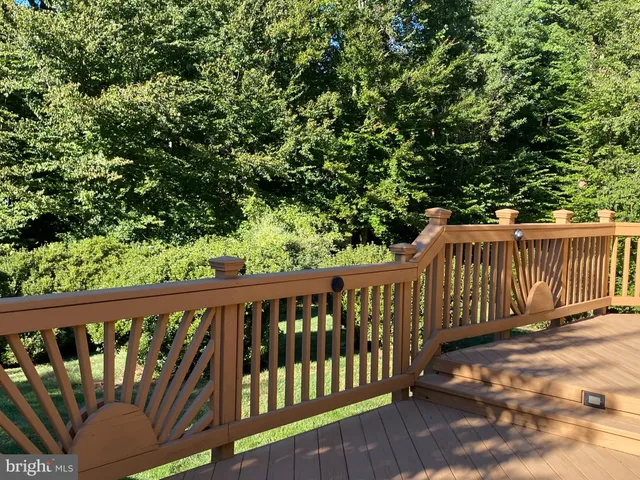 a view of a wooden roof deck