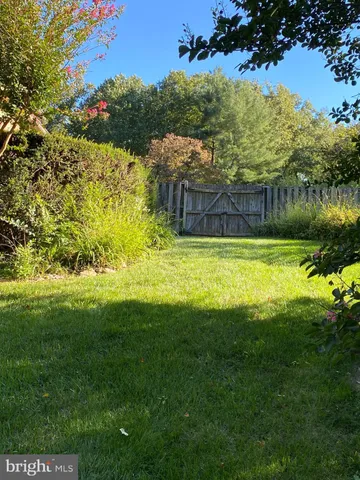 a view of backyard with green space