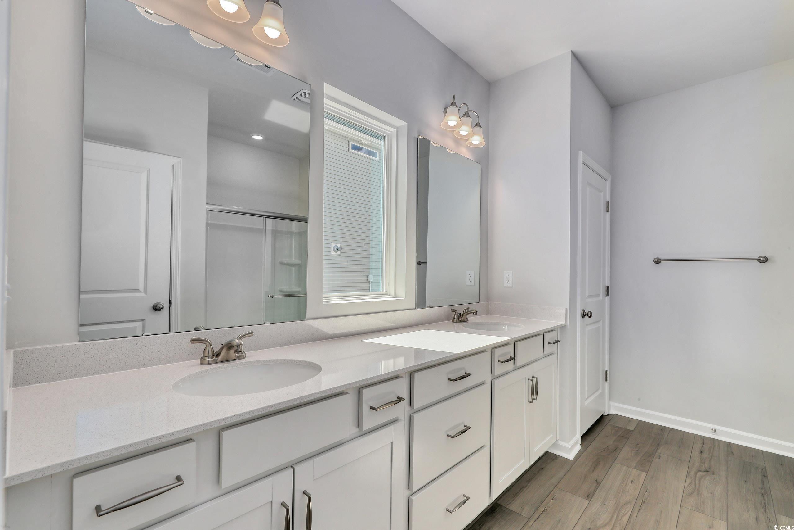732 St Albans Loop Conway, SC 29526 - Photo 11 of 21 Bathroom featuring an enclosed shower, wood-type f