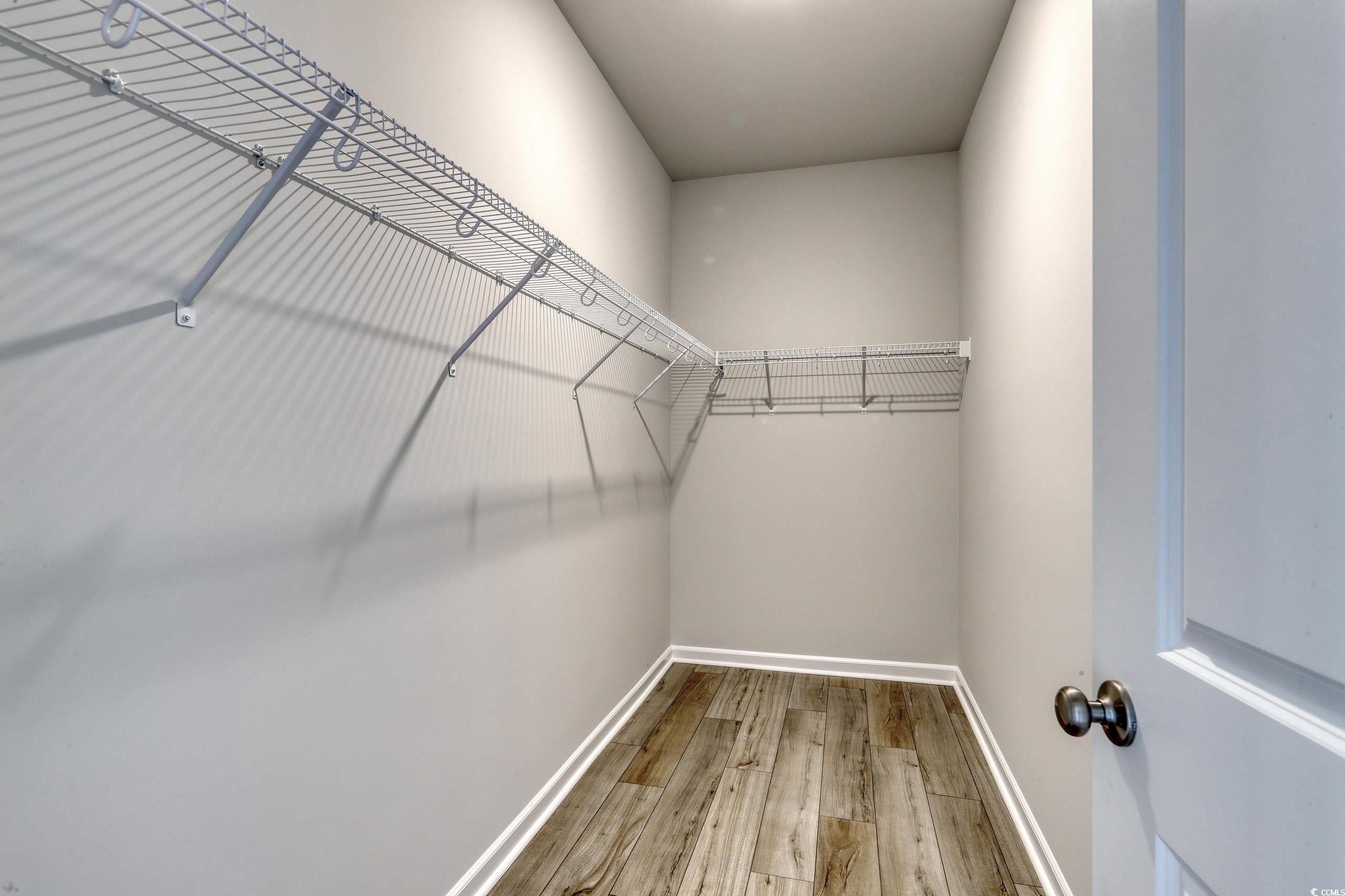 732 St Albans Loop Conway, SC 29526 - Photo 13 of 21 Spacious closet featuring hardwood / wood-style fl