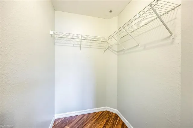 a view of a room with racks on the wall