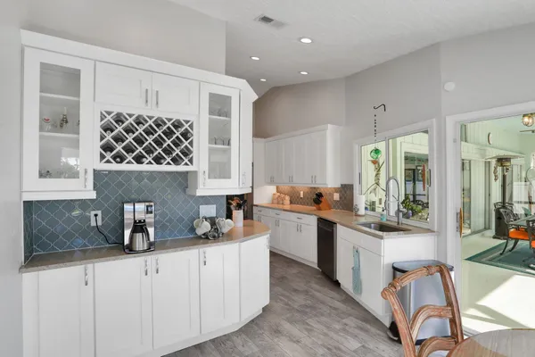 a bedroom with a bed and a table