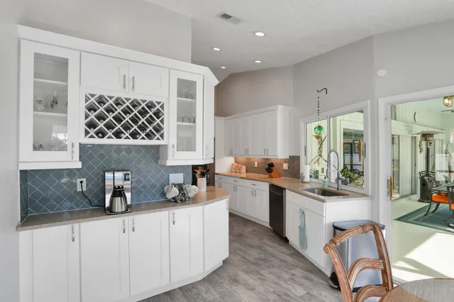 a bedroom with a bed and a table