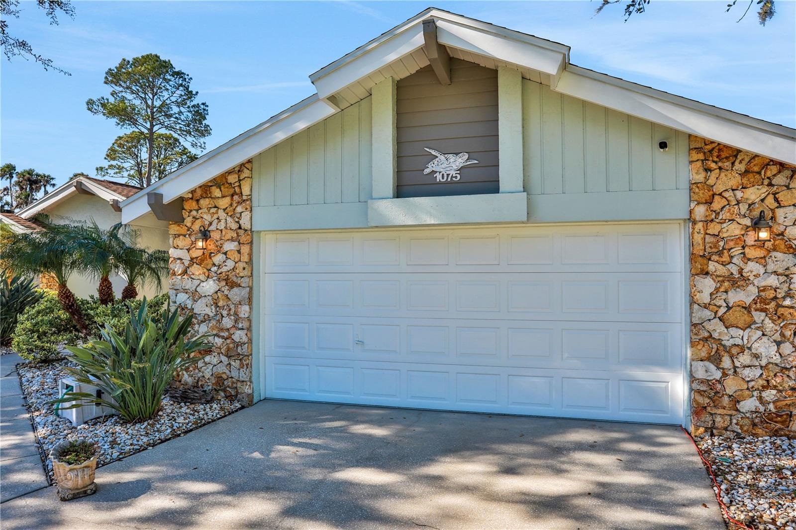 1075 Lambert Avenue Flagler Beach, FL 32136 - Photo 2 of 71 a view of front door