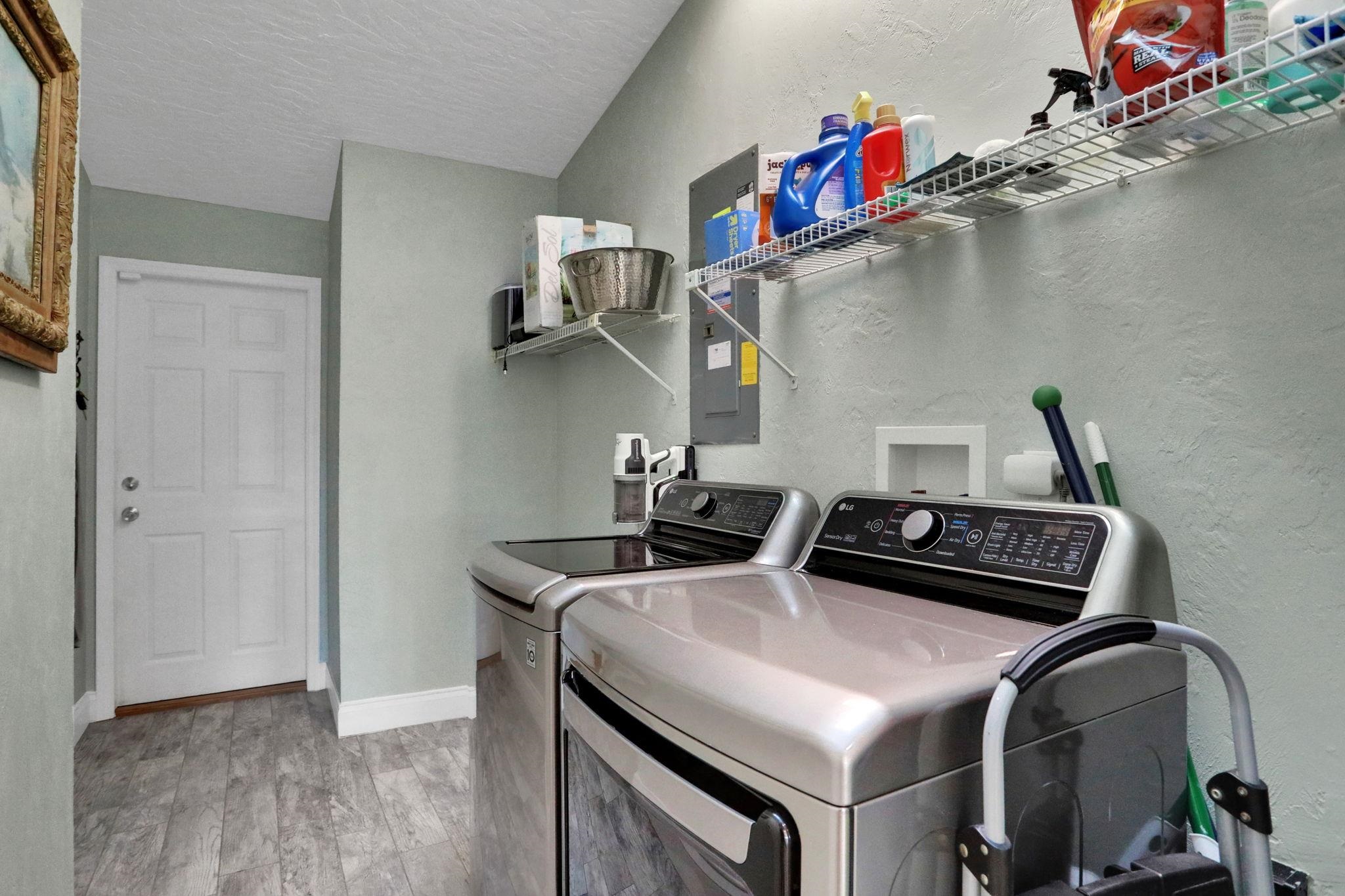 1075 Lambert Avenue Flagler Beach, FL 32136 - Photo 22 of 71 a utility room with dryer and washer