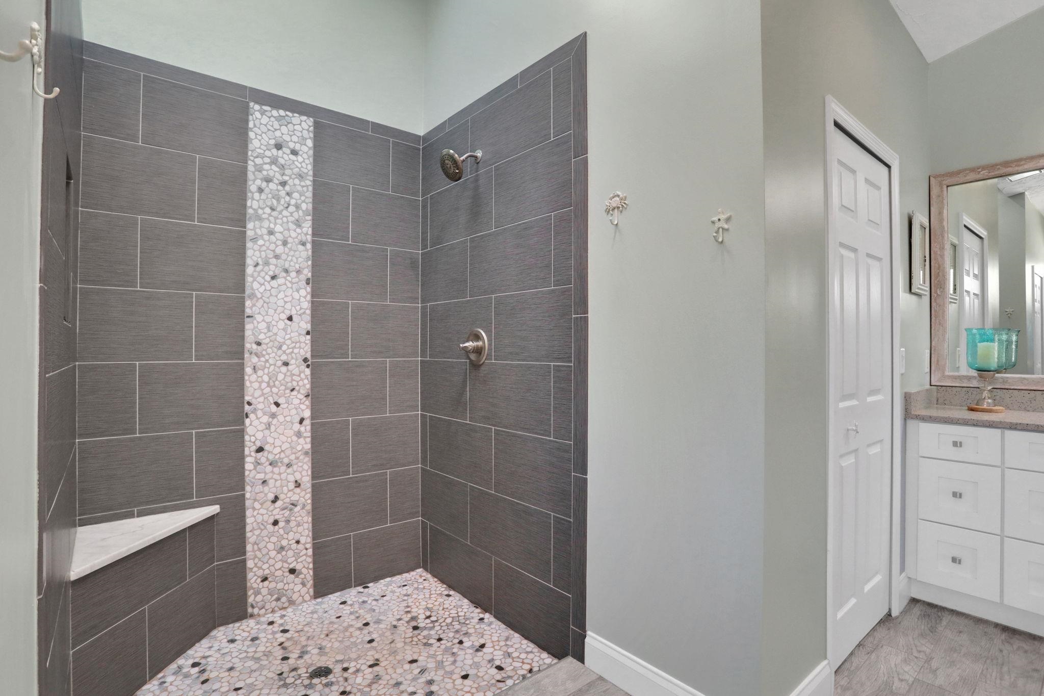1075 Lambert Avenue Flagler Beach, FL 32136 - Photo 31 of 71 a bathroom with a shower and a sink