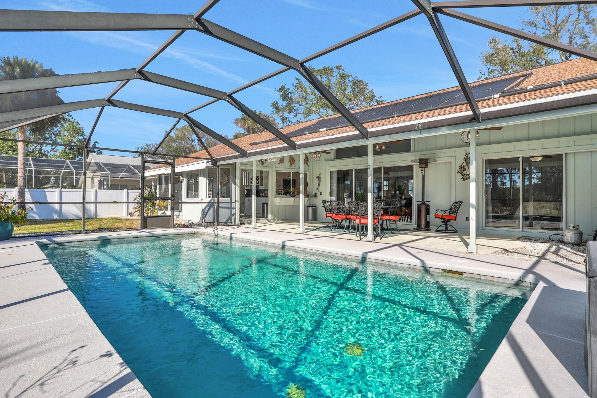 1075 Lambert Avenue Flagler Beach, FL 32136 - Photo 47 of 71 a view of a backyard with sitting area