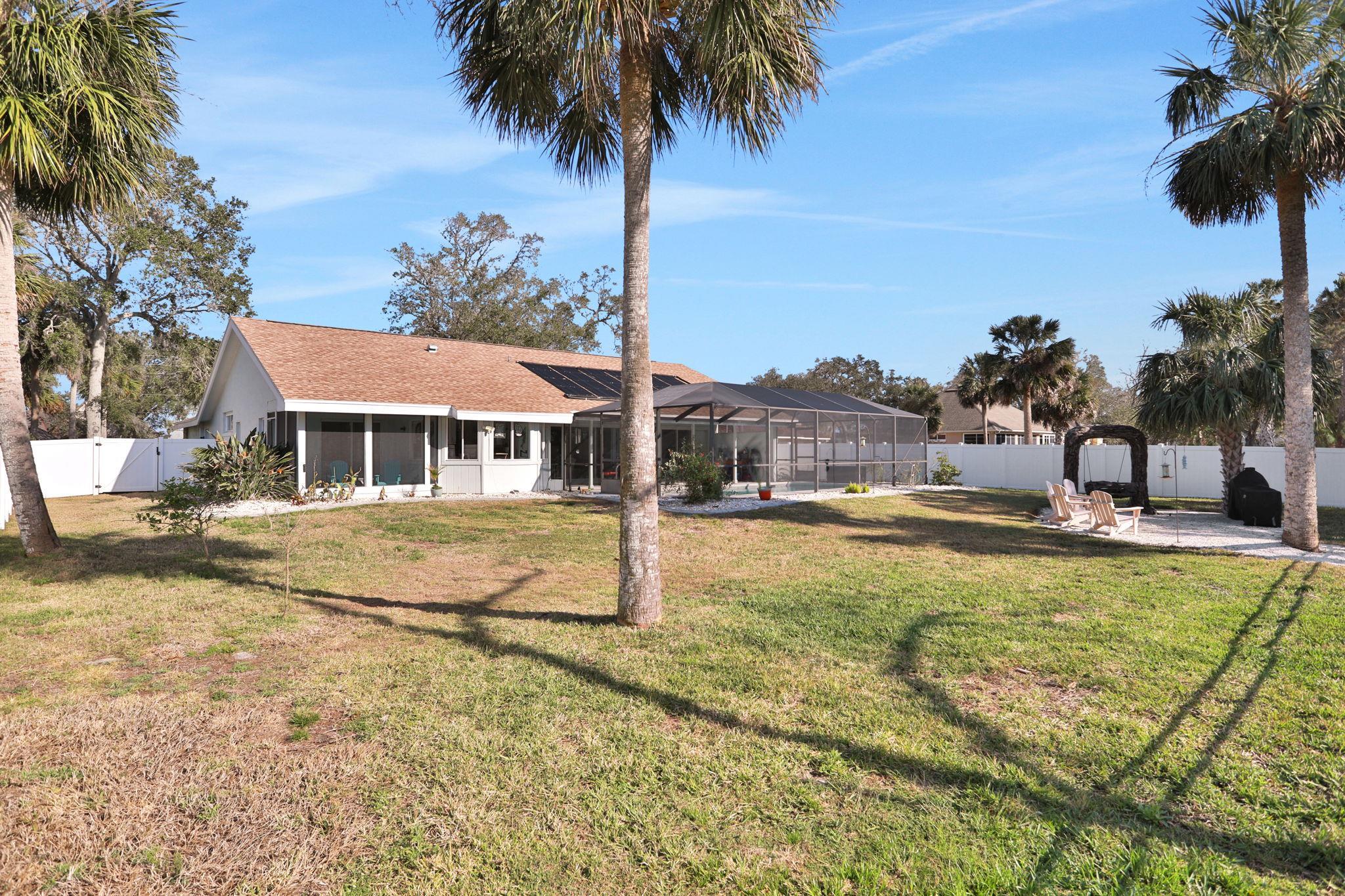 1075 Lambert Avenue Flagler Beach, FL 32136 - Photo 51 of 71 a view of a house with swimming pool