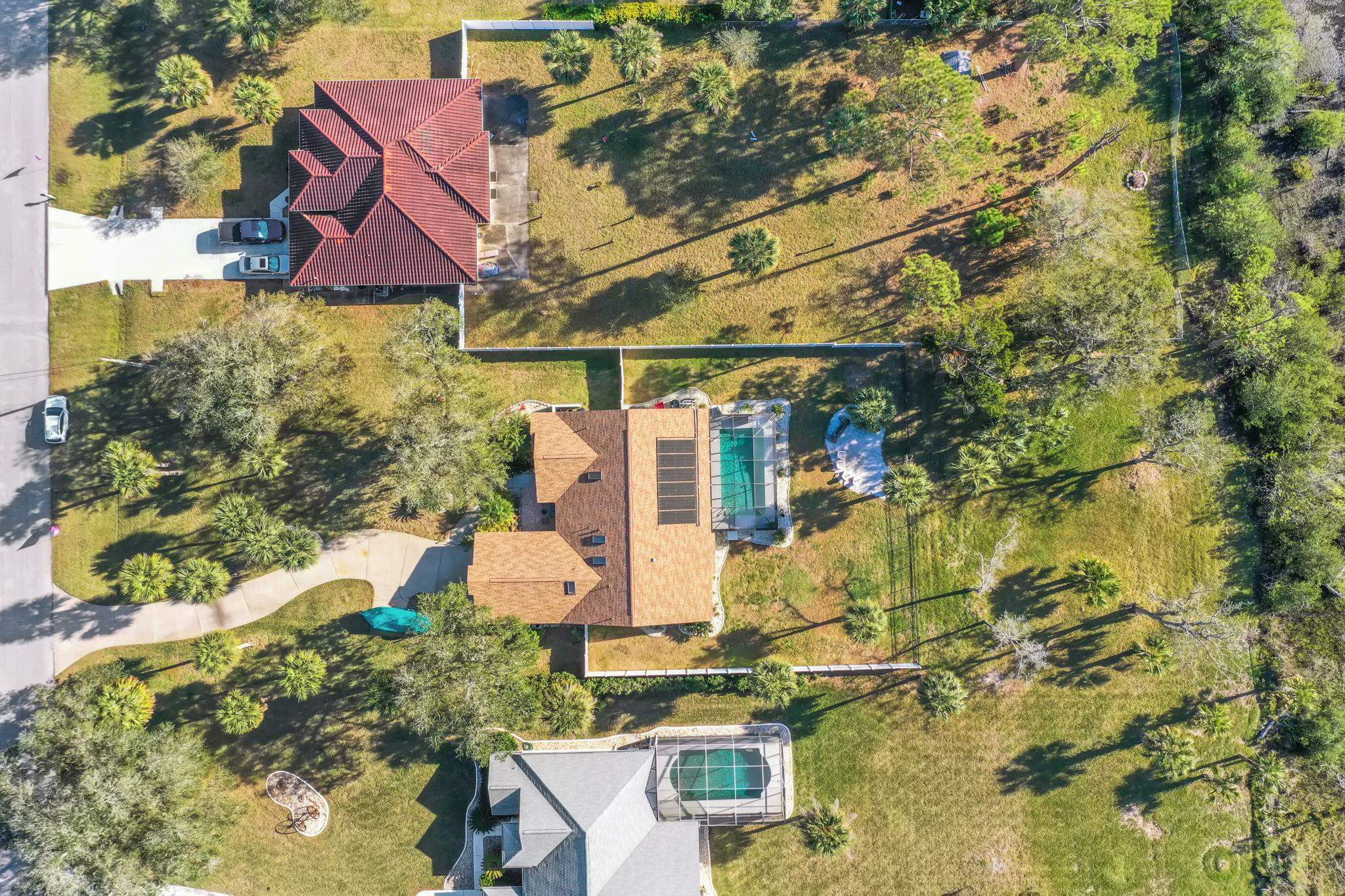 1075 Lambert Avenue Flagler Beach, FL 32136 - Photo 61 of 71 an aerial view of residential houses with outdoor space