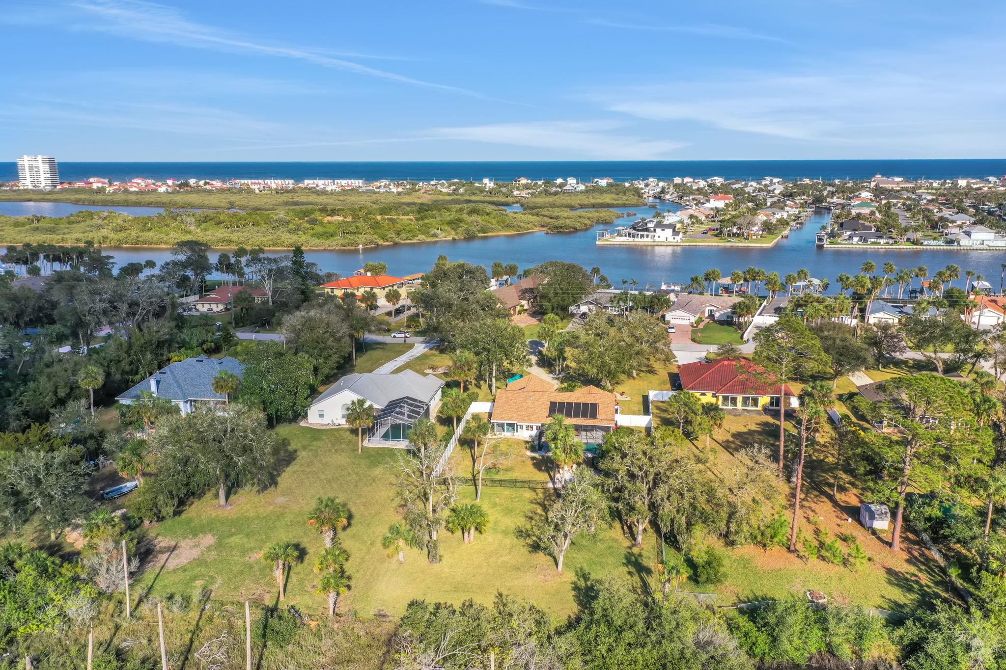 1075 Lambert Avenue Flagler Beach, FL 32136 - Photo 63 of 71 a view of a city with an ocean