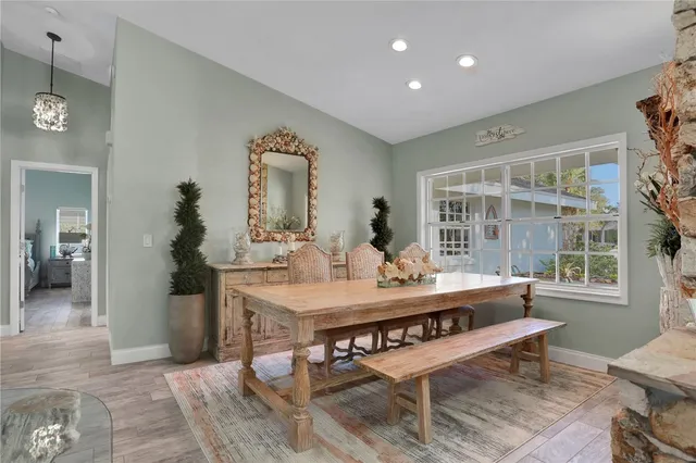a bedroom with a bed and flat screen tv