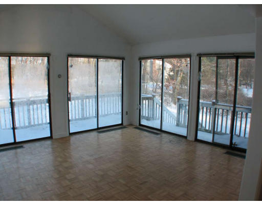 49 Baldpate Road Georgetown, MA 01833 - Photo 6 of 13 a view of an empty room with glass door