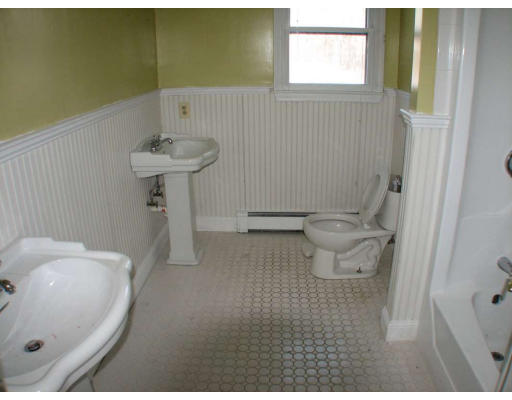 49 Baldpate Road Georgetown, MA 01833 - Photo 7 of 13 a bathroom with a sink toilet and shower