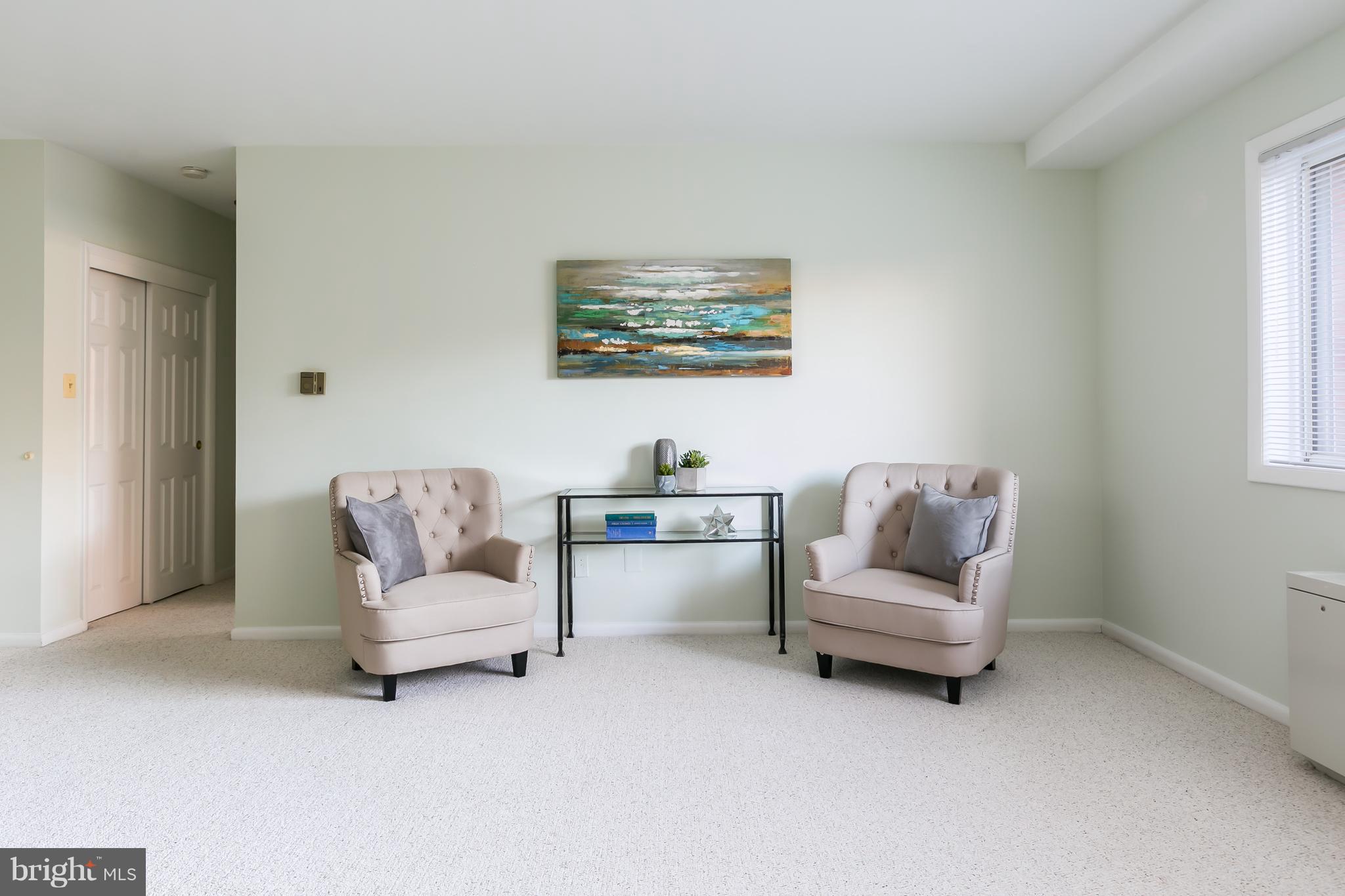 5101 8th Road South, Unit 7 Arlington, VA 22204 - Photo 6 of 32 a living room with furniture and a window