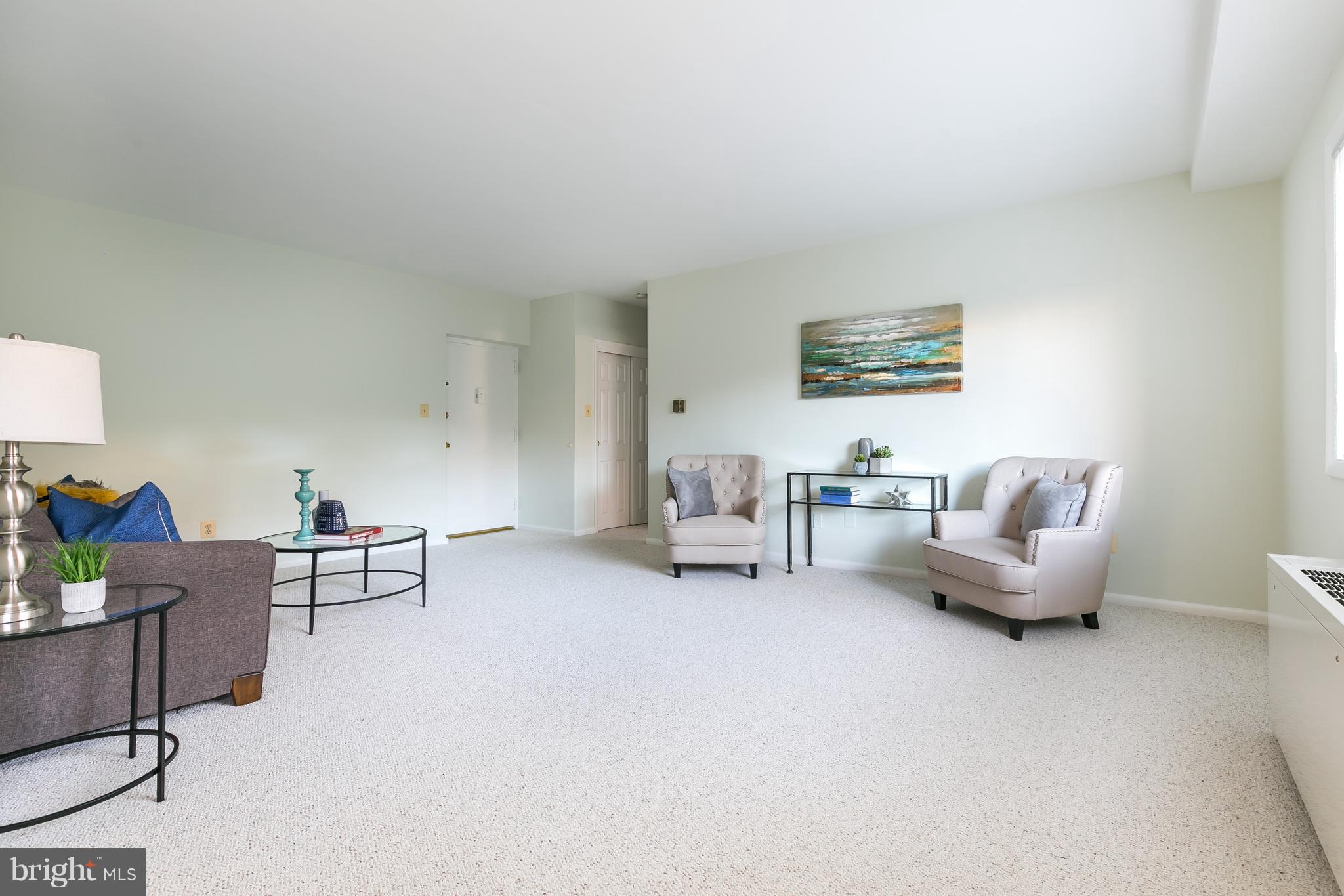 5101 8th Road South, Unit 7 Arlington, VA 22204 - Photo 7 of 32 a living room with furniture and a couch