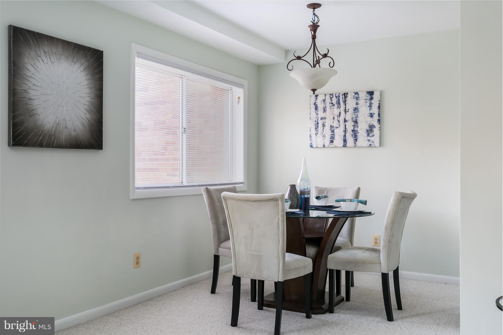 5101 8th Road South, Unit 7 Arlington, VA 22204 - Photo 8 of 32 a view of a dining room with furniture and window