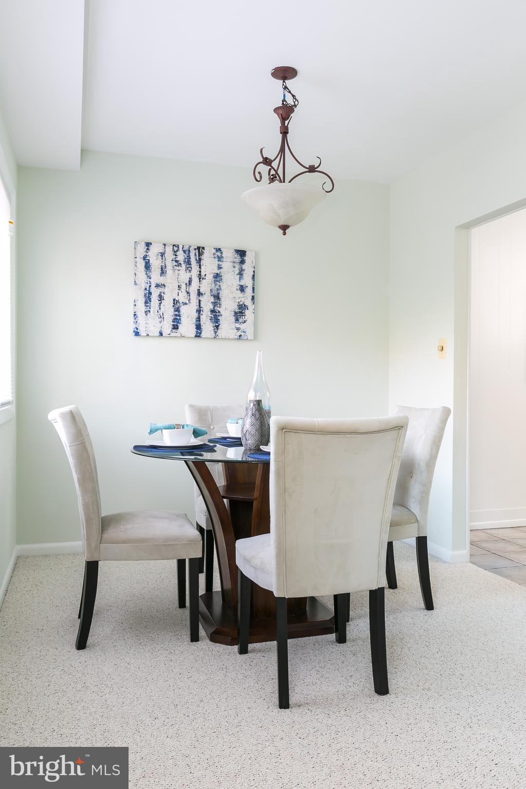 5101 8th Road South, Unit 7 Arlington, VA 22204 - Photo 9 of 32 a view of a dining room with furniture